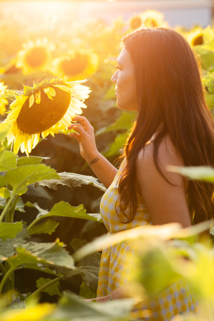 woman in sunflower field