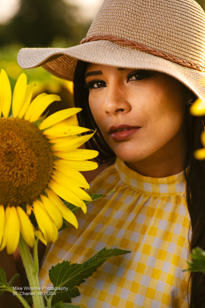 woman in sunflower field