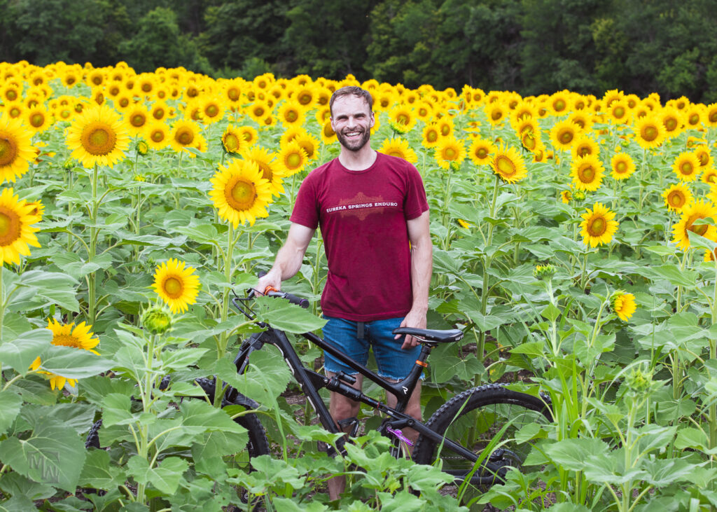 Man and bike in sunflowers