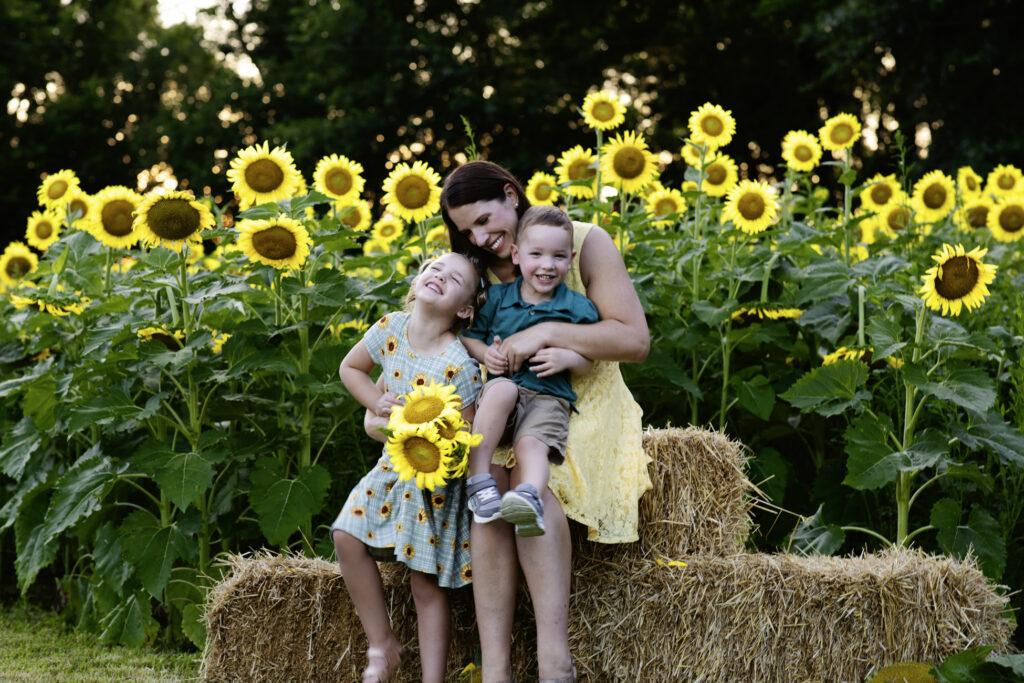 family in sunflowers