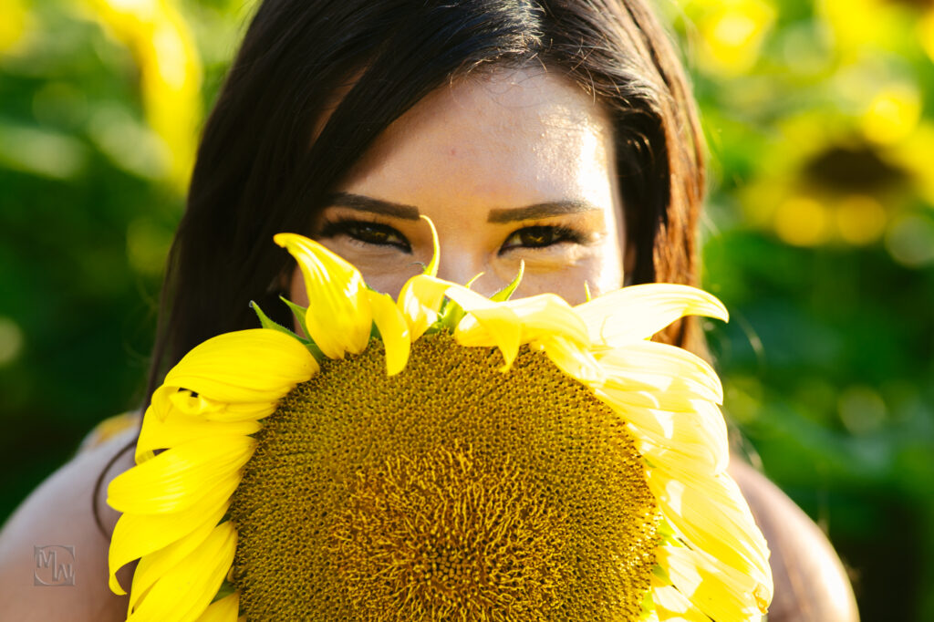 woman in sunflower field
